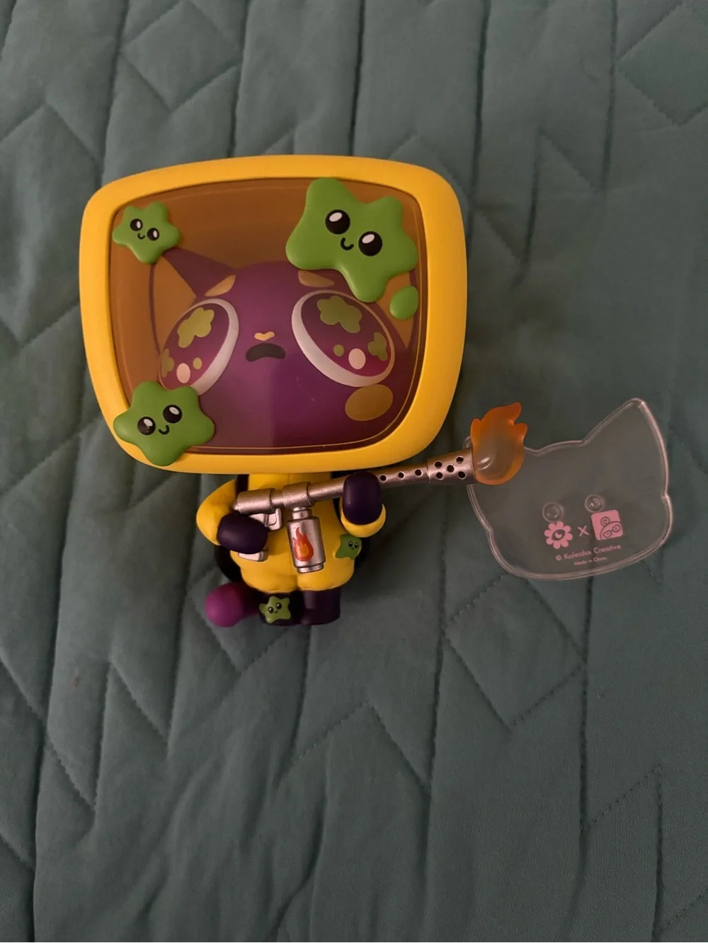 Yellow & Purple Collectible Figure by Kaleidos Creative